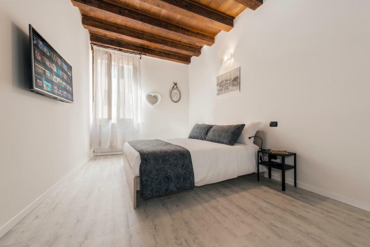 Ponte Postumio Apartment Verona Bagian luar foto